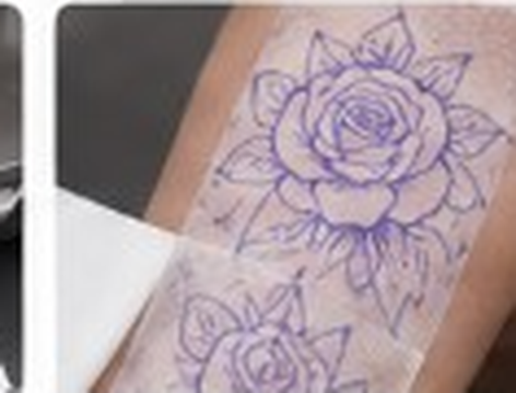 Purple stencil transferred onto an arm